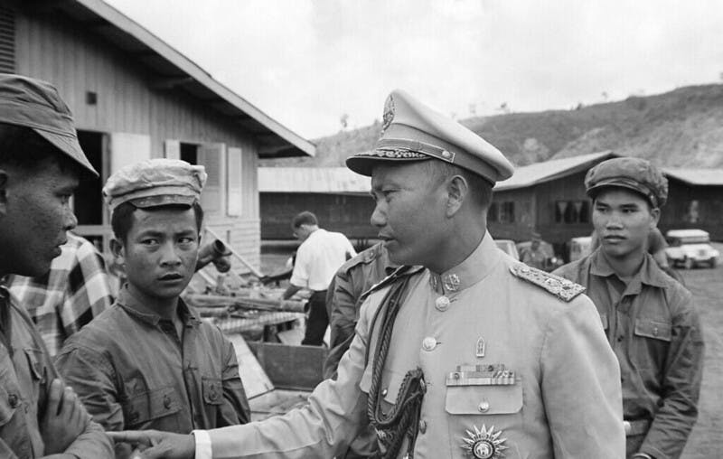 Laotian General with Prisoners, Gen. Vang Pao, right, commander of the Second Military Region in Laos, talks in Sam Thong, Laos on Oct. 17, 1969, with two prisoners captured during fighting with the pro-Communist Pathet Lao near the Plain of Jars. Vang identified these prisoners as North Vietnamese to support the Laotian claim that North Vietnamese forces are in Laos fighting at the side of the Pathet Lao. 